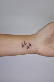Flat symbols tattoo