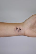 Flat symbols tattoo