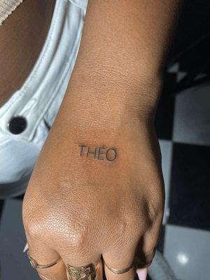 Small lettering tattoo style