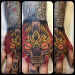 Ornate Hand Mask Tattoo