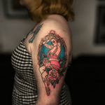 Pin-Up Girl in Ornate Mirror