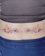 Symmetrical Floral Swirl Tattoos