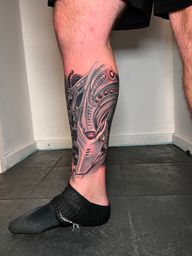 Biomechanical Leg Tattoo