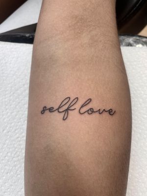 Small lettering tattoo style