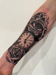 Eye and Clock Tattoo