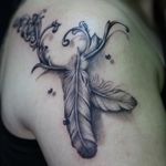 #realistic #feather #blackandgrey tattoo