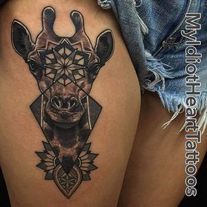 Tattoo by artist Roque Mendez #geometrictattoo #geometricanimal #blackgreytattoo #mandalatattoo #art #dallastattooartist #giraffe #golddust #golddusttattoo #geometric #giraffe #mandala #blackandgrey