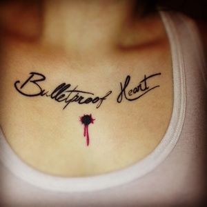 Tattoo uploaded by Tattoodo • #bullet #shot #script #chestpiece • Tattoodo