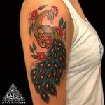Tattoo by larktattoo artist Neal Aultman #peacock #color #traditional #traditionaltattoo 