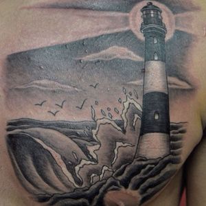 Fire Island lighthouse tattoo by Tara #fireisland #lighthouse #longisland #lighthousetattoo #chest #islandlife #tattootara #blackandgrey #bodydesigns