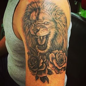 What mood are you in today? #beast #lion #blackandgrey #roses #villagetattoonyc