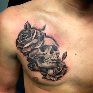 skull and rose shoulder tattoo