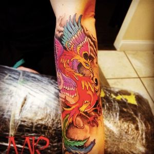 A color Phoenix by tattoo artist, Mike Raze #dakotainktattoo #color #colortattoos #magnums #liners #cheyennehawkmachines #pheonix #pheonixtattoos #longislandtattooshop #mikeraze #mikerazetattoos