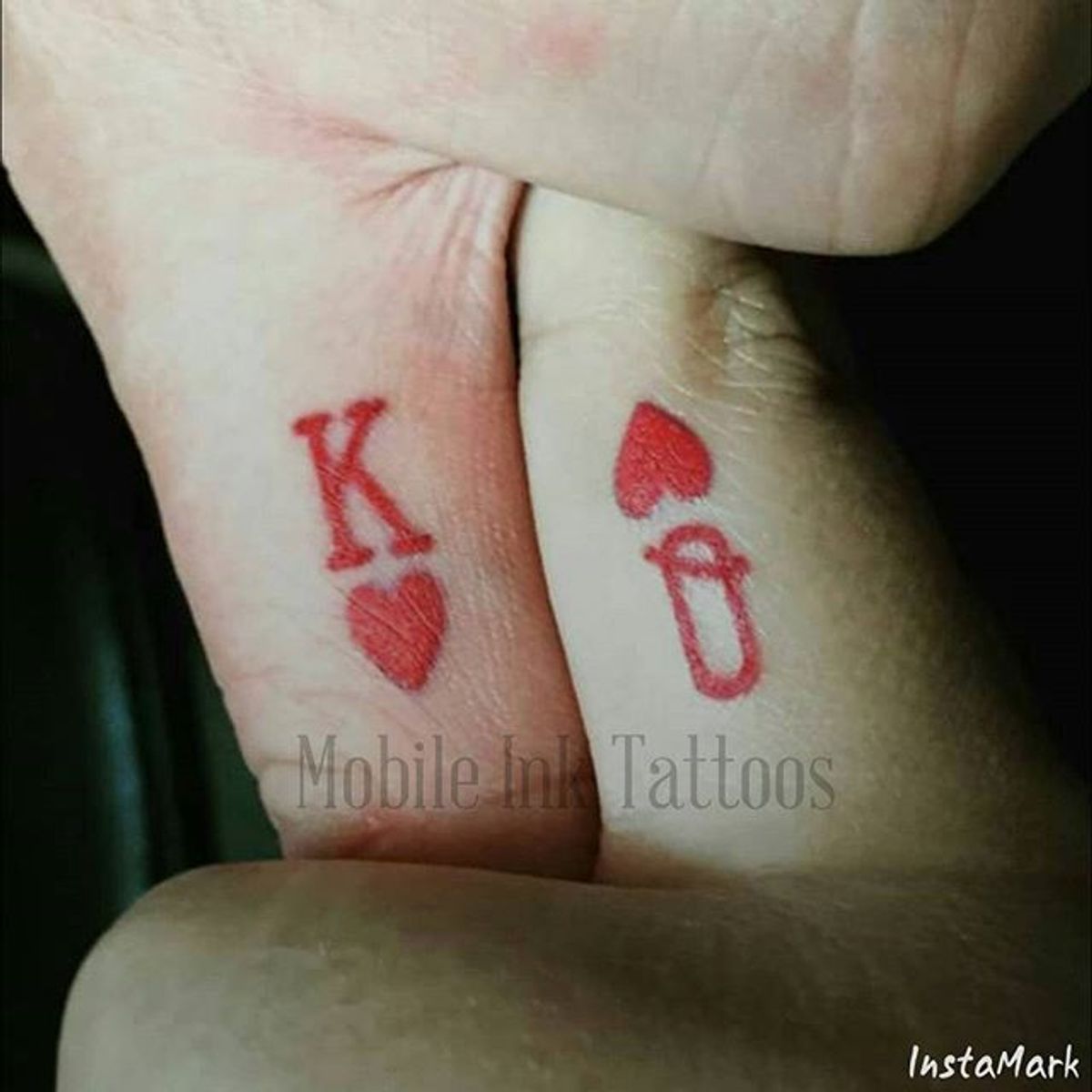 king of hearts tattoo on finger