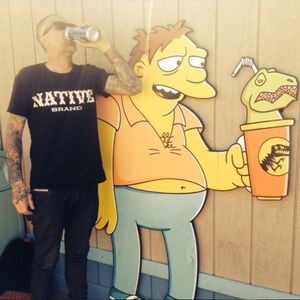 A photograph of Andrew Mcleod knocking back some brew with Barney (IG—peppermintjones). #AndrewMcleod #daggers #traditional
