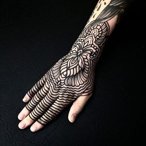 Decorative hand piece. (via IG - charlysaconi) #geometric #ornamental #blacktattoo #dotwork #decorative #forearm #hand