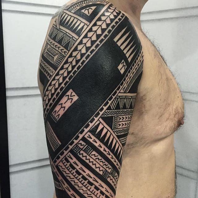 tribal elbow tattoos