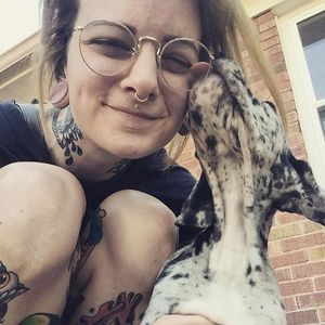 Tattooist Annie Burkhard and an ADORABLE PUPPY. (via IG—annie_tattoos) #AnnieBurkhardTattoos #Traditional #PopCulture #Cartoons #Sessions