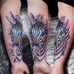 Beautiful pink, blue and purple watercolor zebra tattoo by Jay Van Gerven. #watercolor #JayVanGerven #zebra #inksplatter #painterly