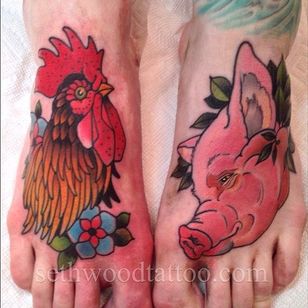 A fierce looking rooster and sad pig by Seth Wood (IG—sethwoodtattoo). #pig #pigandrooster #rooster #SethWood #traditional
