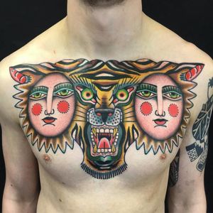 Chest piece tattoo by Teidi #Teidi #color #favoritetattoo #Japanese #traditional #mashup #surreal #face #portrait #tiger #chestpiece #cat #junglecat #stripes #fangs