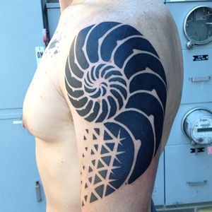 Another ammonite tattoo by Cassady Bell #ammonite #CassadyBell #blackwork #ammonitetattoo