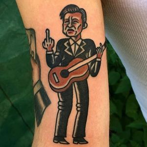 A badass traditional tattoo of Johnny Cash by Wan Love (IG—wantattooer). #celebrity #JohnnyCash #portraiture #traditional #WanLove