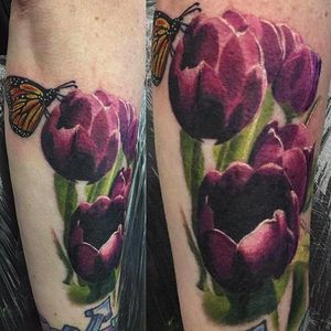 Tulips and butterfly by Brad Charles (via IG -- bradcharlestattoo) #bradcharles #tulips #butterfly