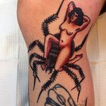 An old school looking pinup holding down a spider with her legs. Tattoo by Sergey Kartoha. #SergeyKartoha #girltattoo #oldschooltattoo #traditionaltattoo #spider #pinup
