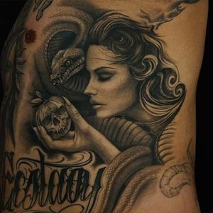 Eve, snake and the forbidden fruit. Tattoo by James Strickland. #realism #blackandgrey #JamesStrickland #eve #apple #snake #forbiddenfruit
