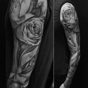 Floral sleeve inspired by the client's own photographs. By David Allen. #realism #blackandgrey #painterly #DavidAllen #flower #floral