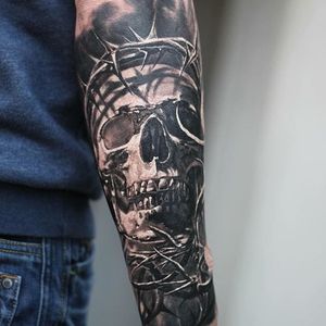 Barbed wire skull tattoo by Mads Thill. #blackandgrey #realism #skull #wire #barbedwire #MadsThill