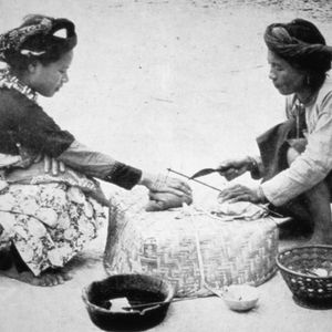 A village elder tattooing a Paiwan woman's hand. #aboriginal #AncestralGlory #Paiwan #Taiwan #yifuchi