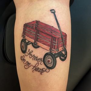 Little red wagon by Mary Hankins (via IG -- hailmarytattoos) #maryhankins #wagon #redwagon #wagontattoo #redwagontattoo #Littleredwagontattoo