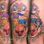 Awesome and colorful tattoo by Alexine (IG_Alexine) of the many major characters from the show. #AdventureTime #Alexine #Bubblegum #Finn #Jake #IceKing #LSP #Marceline #LadyRainicorn