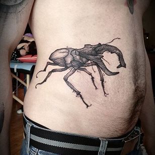 Tatuaje de escarabajo por Jean Carcass