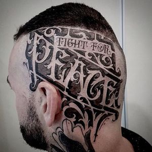 'Fight for peace' side of the head tattoo by Sam Taylor. #lettering #blackandgrey #SamTaylor #decorative