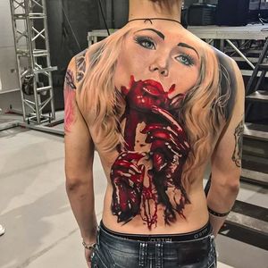 Bloody but beautiful back tattoo by Alex Noir. #realism #colorrealism #AlexNoir #blood #horror #woman