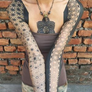Geometric sleeve tattoos by Kenji Alucky, photo from Kenji's Instagram @black_ink_power #geometric #blackwork #tribal #patternwork #dotwork