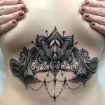 Blackwork underboob tattoo by Nikki Snyder. #underboob #decorative #blackwork #dotwork #linework #NikkiSnyder