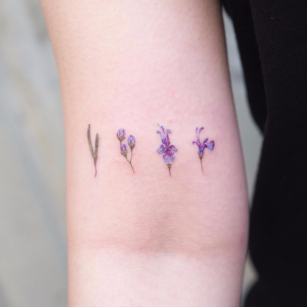 Small violet flower tattoo  Tattoogridnet