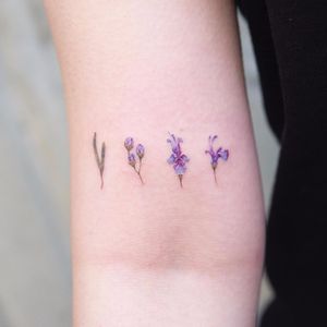 Violet flower tattoo by Sol Fairytale #SolFairytale #Koreanartist #color #smalltattoo #minimal #realism #realistic #watercolor #painterly #violet #flowers #flower #leaves #nature #tattoooftheday