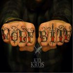 Wolf Bite Knuckle Tattoos by Kid Kros #KidKros #Knuckles #KnuckleTattoos #HandTattoos #Traditional #Black #Lettering #Script