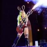 Teta from the Fuel Girls rocking out with a roman candle on a duel-necked guitar. #acrobatics #burlesque #LondonTattooConvention #FuelGirls #pyrotechnics