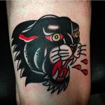 Beautifully done panther head tattoo. Clean and solid work by Aldo Rodriguez. #AldoRodriguez #GrandUnionTattoo #traditionaltattoo #boldtattoos #panther #pantherhead