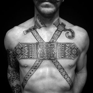 Beautiful and intricate chestpiece of an axe and hammer. Cool work by Anick Andrew. #geometric #axe geometry #intricate #blackwork #anichandrew