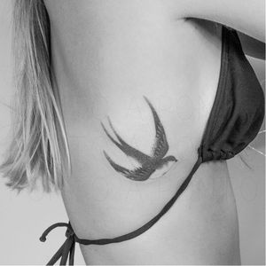 Swallow tattoo by Ponto Tattoo #PontoTattoo #dotwork #pointillism #small #swallow #bird