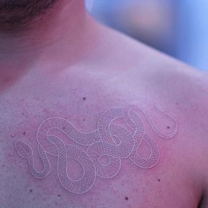 White ink tattoo by Mirko Sata. #MirkoSata #whiteink #serpent #snake