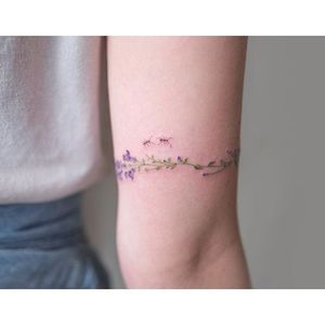 Floral bracelet tattoo by Sol. #Sol #soltattoo #solart #SouthKorean #flower #floral #bracelet #band #lovely #subtle #fineline