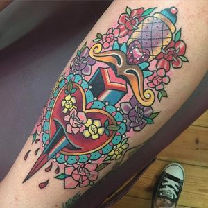 Traditional heart dagger tattoo with a twist by Sarah K. #SarahK #girly #traditional #dagger #flower #heart #heartdagger